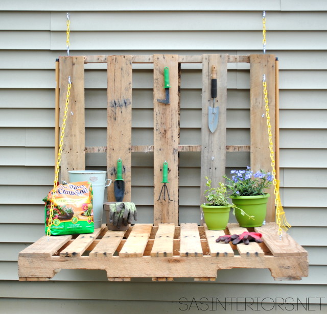 #DIY: Vertical Pallet Gardening Table - No more gardening on the ground with a hurt back. Create a garden table for less than $10. Created by @Jenna_Burger of WWW.JENNABURGER.COM
