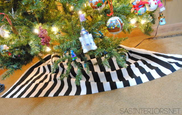 Easiest, Fastest, + Cheapest Christmas Tree Skirt.  Use 1.5 yd of fabric and wrap around tree.  Follow easy instructions by @Jenna_Burger of WWW.JENNABURGER.COM