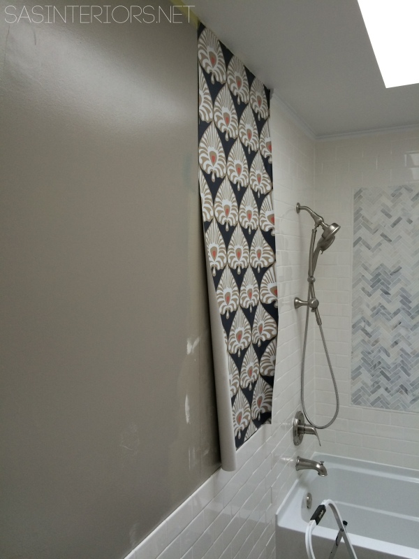 Bathroom Remodel: DIY bathroom makeover in 30 days. This phase of the project is installing wallpaper. Check out the details + the before & after NOW