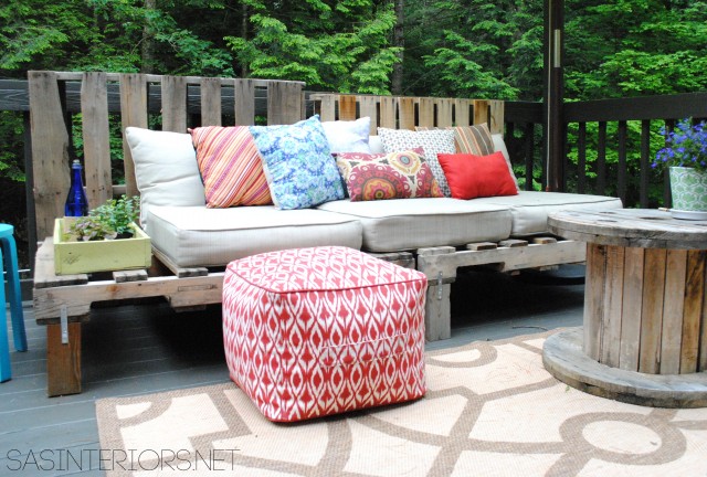 A Summer Essential for the patio or deck: an Outdoor Pallet Sofa - Easy to make and costs less than 5 dollars! 