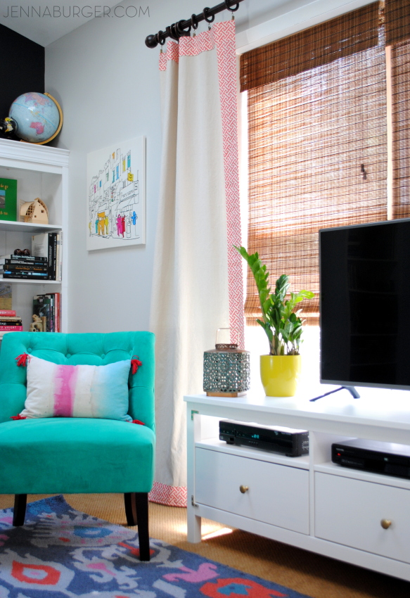 Living Room Makeover with bold black + pops of color [emerald, raspberry, coral, and light blue] Design by Jenna Burger Design, www.jennaburger.com