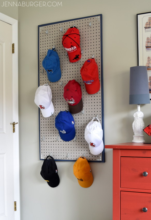 DIY: Pegboard Baseball Cap Organizer - The perfect 'home' for the hat collection. Do It Yourself Tutorial @ www.jennaburger.com